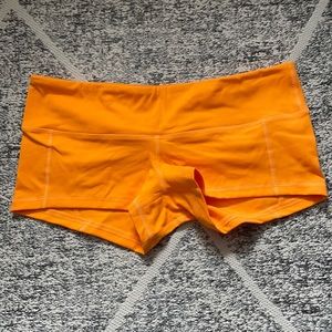 FLEO bright orange shorts